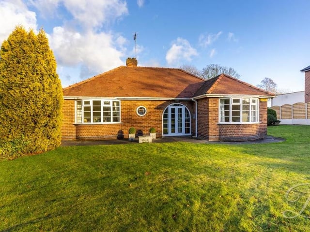 Almost time to say farewell to the Oak Tree Lane bungalow. Here is a conventional, ground-level view of the frontage.