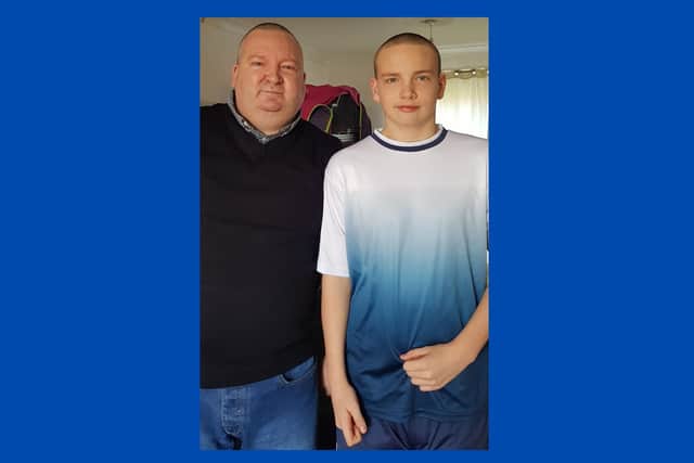 Stephen Bryan and his son Alex after their headshaves.