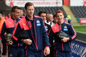 Steven Taylor, Mike Williamson, and Jack Colback share a joke as they arrive before the Barclays Premier League match between Swansea City and Newcastle United at the Liberty Stadium.