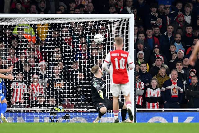 Sunderland goalkeeper Lee Burge can't stop Arsenal's second goal scored by Nicolas Pepe.