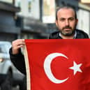 Enfes Turkish restaurant manager Ahmed Altikalac has pleaded with the world "not to forget" and to continue to help Turkey.