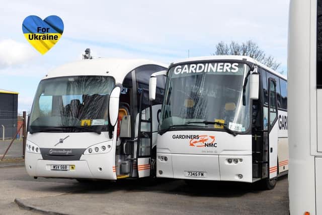 Two of the coaches which will be used to transport aid and then relocate Ukrainian refugee families.