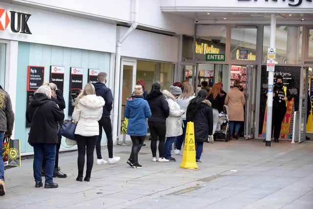 Boxing Day queues outside The Bridges' Market Square entrance to enter The Card Factory.