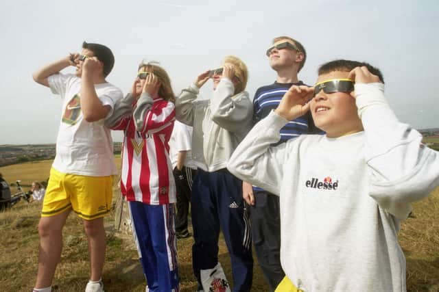 Watching the eclipse over Tunstall Hill in 1999 were Simon Rossi, Charlotte, Eleanor and Nicholas Farrell and Fernando Rossi.