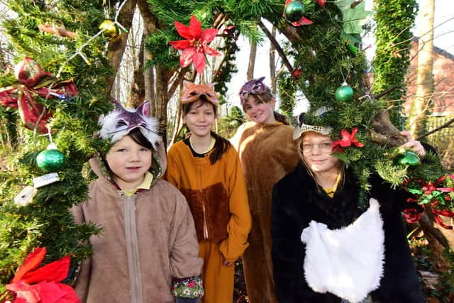 Year 6 Pupils (left to right) Cora, Katie, Amelia, and Sophie dressed as characters from the book Mouse's Christmas.