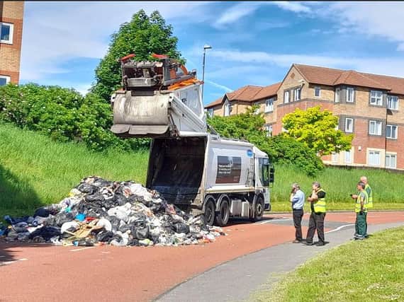 The waste dumped into the street in Felling after the bin load caught fire