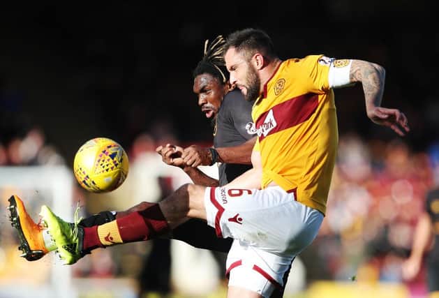 Peter Hartley in action for Motherwell.