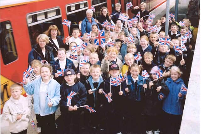 Crowds of children lined the stations to welcome the Queen as she travelled from Park Lane Interchange to Fellgate.
