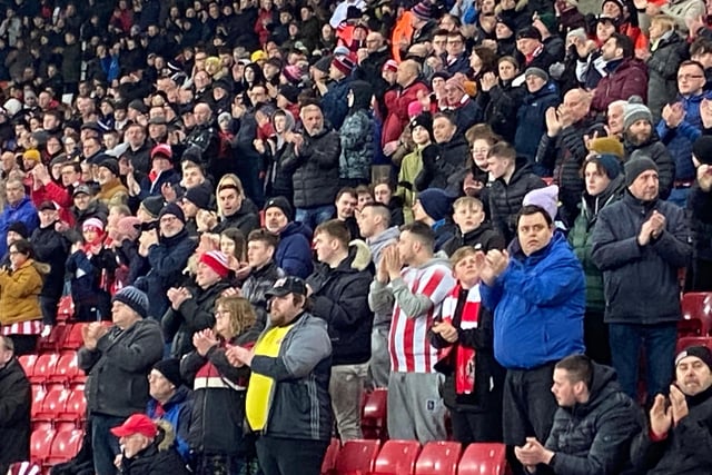 Sunderland fans take part in a minuets applause before the Fleetwood Town game at the Stadium of Light.