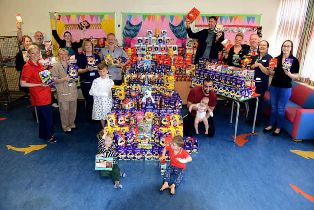 Sunderland Royal Hospital staff patients and parents are joined by Viv Watts, Kevin Ball, Kieron -Brady and Ian Whyte as they pose with many donated Easter Eggs in 2019