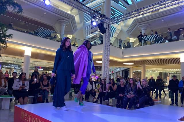 Shoppers can watch the live runway shows.