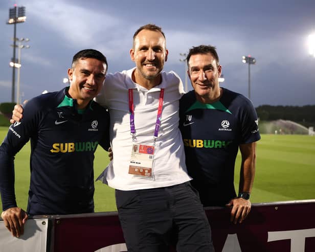 DOHA, QATAR - NOVEMBER 17: Former Socceroos Tim Cahill and Tony Vidmar pose with former team mate Mark Schwarzer during the Australia training session at the Aspire Training Ground on November 17, 2022 in Doha, Qatar. (Photo by Robert Cianflone/Getty Images)