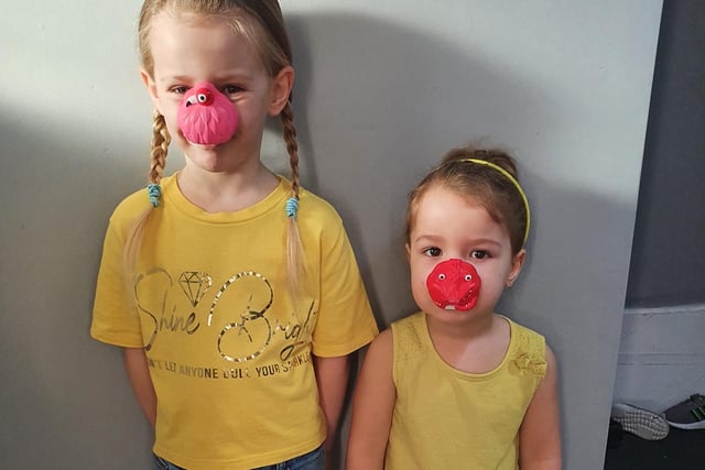 Alanna-Rose, age 6, and Adley-Rae, age 2, dressed in yellow to support Ukraine on Red Nose Day.