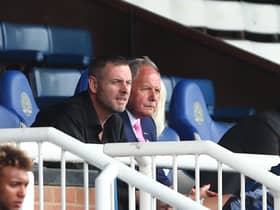 PETERBOROUGH, ENGLAND - AUGUST 14: Darragh MacAnthony president of Peterborough United and Director of football Barry Fry during the Sky Bet Championship match between Peterborough United and Derby County at London Road Stadium on August 14, 2021 in Peterborough, England. (Photo by Marc Atkins/Getty Images)