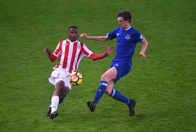 STOKE ON TRENT, ENGLAND - JANUARY 10: Joe Anderson of Everton tackles Soiyir Sanali of Stoke during the FA Youth Cup Fourth Round match between Stoke City and Everton at Britannia Stadium on January 10, 2019 in Stoke on Trent, England. (Photo by Nathan Stirk/Getty Images)