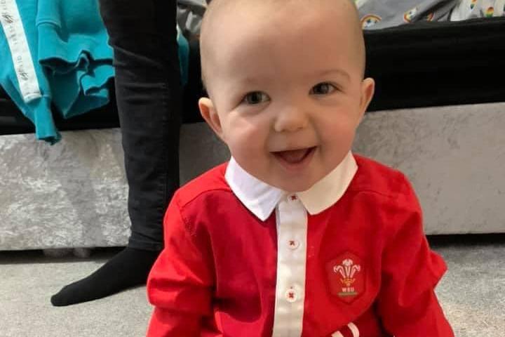 Tracey Final Young shared this sweet image of her baby grandson, Oslo, ready to watch the Six Nations.