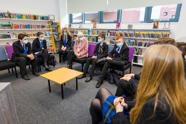 Members of the school's Eco Team discussing environmental concerns with Catherine Hearne, non-executive director at Together for Children.

Photograph: Elliot Nichol