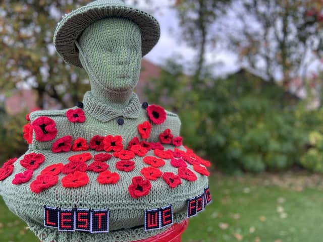 The postbox topper is encouraging members of the public to remember those who gave their lives while serving their country.