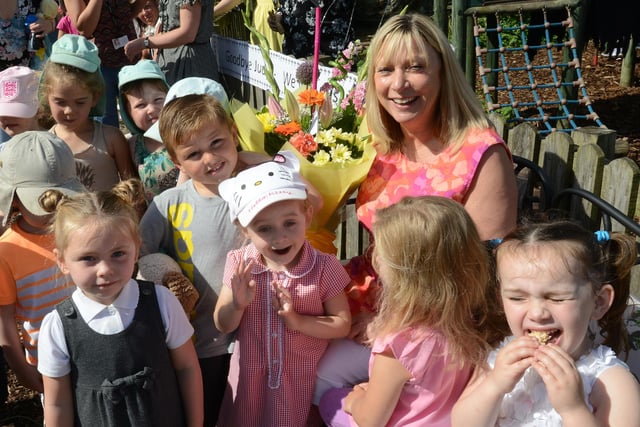 Retiring as head teacher at Pennywell Early Years  Centre, Sunderland was Judy Donnelly in 2014 and she was pictured here receiving gifts from children at their annual teddy bears picnic.