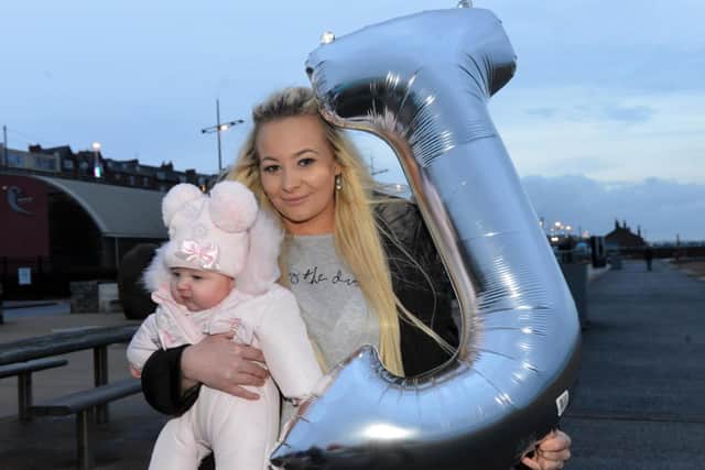 Jess King, pictured with her daughter Josie Rae, as they released a balloon on what would have been Josie's 17th birthday.