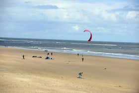 Kite surfers take advantage of the new relaxed lockdown measures on Seaburn Beach.
