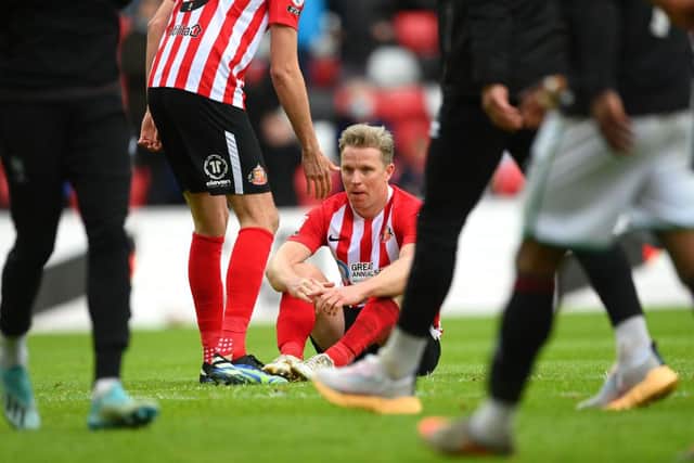 Sunderland captain Grant Leadbitter reacts dejectedly after the Sky Bet League One Play-off Semi Final 2nd Leg match between Sunderland and Lincoln City  at Stadium of Light on May 22, 2021 in Sunderland, England. (Photo by Stu Forster/Getty Images)