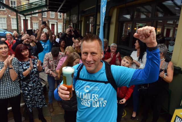 Squadron Sergeant Major David Ansell completes his year-long half marathon walking challenge.