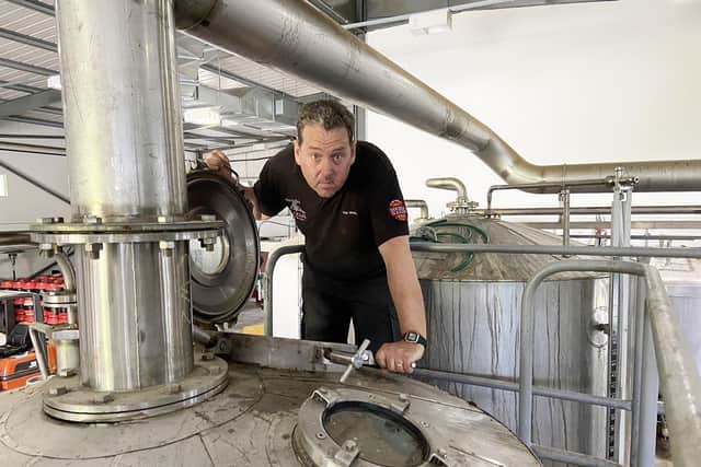Maxim Brewery brewing director Glen Whale inspecting one of the firm's latest beers. Picture by Frank Reid