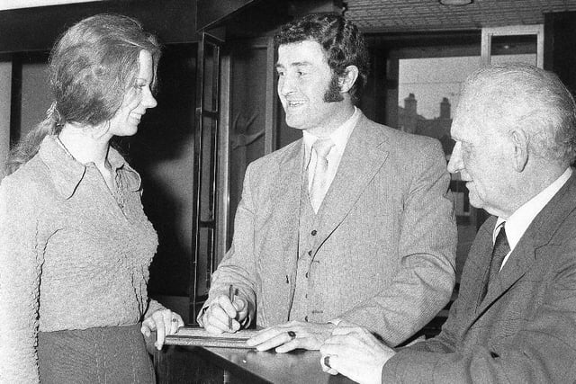 Charlie Hurley signed an autograph for receptionist Sheila Money before leaving his Seaburn hotel for the match. He was manager of opponents Reading.