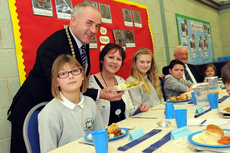 The Mayor Coun Ernest Gibson serves lunch to Forest View Primary School headteacher Cheryl Ward and school council members. Who remembers this from 2014?
