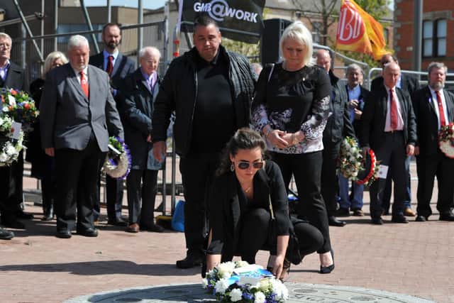 Jason Burden's sister Rachel lays a wreath with her parents Trevor and Maria at a Workers' Memorial Day Service held in Hartlepool last April.
