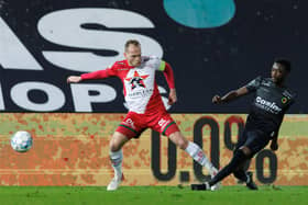 Essevee's Laurens De Bock and Oostende's David Atanga fight for the ball during a soccer match between Zulte-Waregem and KV Oostende, Wednesday 09 February 2022 in Waregem, a postponed match from day 22 of the 2021-2022 'Jupiler Pro League' first division of the Belgian championship. BELGA PHOTO KURT DESPLENTER (Photo by KURT DESPLENTER/BELGA MAG/AFP via Getty Images)