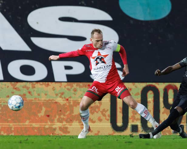 Essevee's Laurens De Bock and Oostende's David Atanga fight for the ball during a soccer match between Zulte-Waregem and KV Oostende, Wednesday 09 February 2022 in Waregem, a postponed match from day 22 of the 2021-2022 'Jupiler Pro League' first division of the Belgian championship. BELGA PHOTO KURT DESPLENTER (Photo by KURT DESPLENTER/BELGA MAG/AFP via Getty Images)