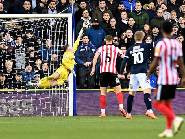 Anthony Patterson makes a fine save at Millwall
