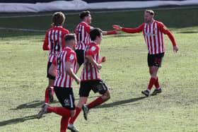 Aiden McGeady celebrates with teammates after he scores against Peterborough United.