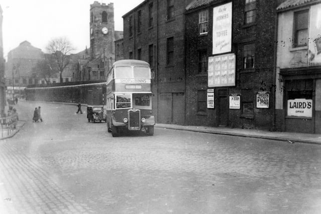 It's 1953 and here is the scene looking North into Low Row from the junction of Chester Road as one of the new Sunderland Corporation Buses heads for Telford Road.