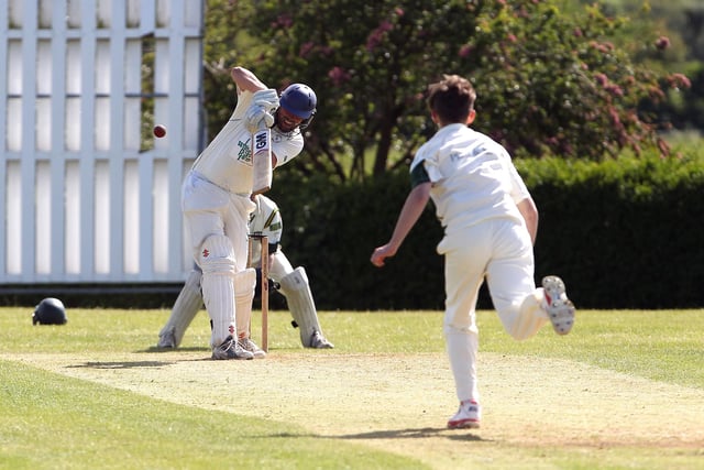 Lea Park bowler Jim Roberts bowls at Farnsfield's Anthony Moore, who hits the ball high and is caught out, on 6th June 2015.