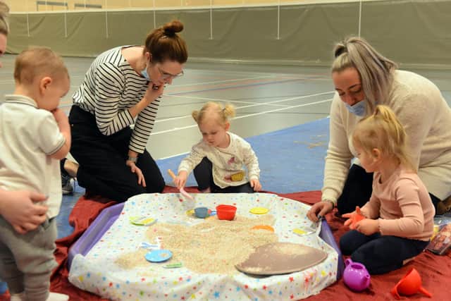 Mums and toddlers enjoy getting messy with ARTventurers at the Beacon of Light.