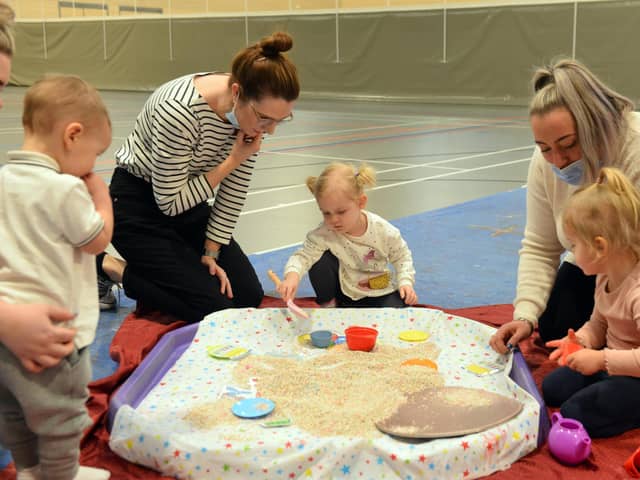 Mums and toddlers enjoy getting messy with ARTventurers at the Beacon of Light.