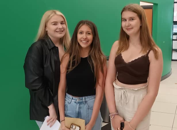 Lily Leonard, Maddy Barrow and Megan Lear after receiving their results.