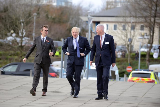 Boris Johnson is greeted by University of Sunderland Vice Chancellor Sir David Bell and National Glass Centre director Keith Merrin (left) on his visit in 2020.