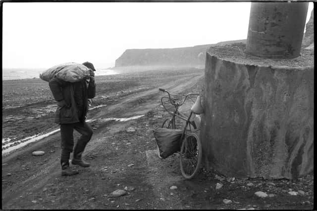 Coal scavenger on the beach at Easington Colliery, October 1987 by Mark Pinder