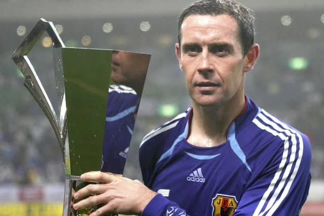 David Weir of Scotland holds a winning trophy after playing the Kirin Cup Soccer 2006 between Scotland and Japan at the Saitama stadium on May 13, 2006 in Saitama, Japan. (Photo by Koichi Kamoshida/Getty Images)