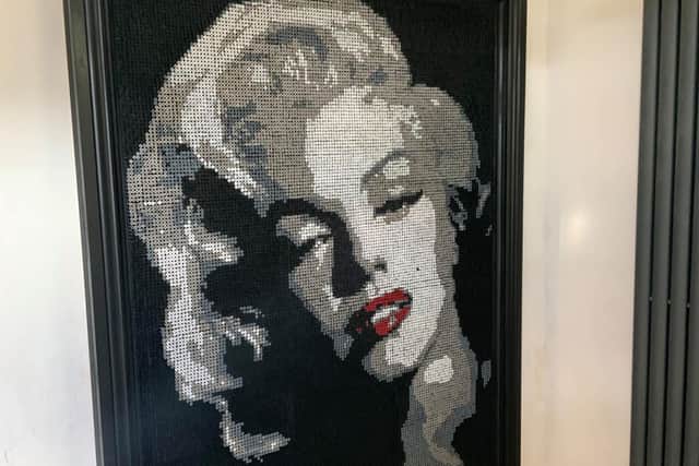 The ingenious Marilyn Monroe portrait was created with screws and a cordless drill, rather than a brush and paint.