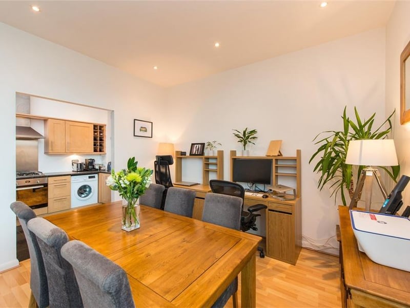 Dining room through to kitchen.