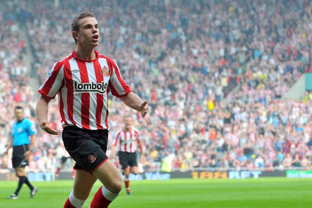 Jordan Henderson pictured after he scored his first goal against Wigan Athletic