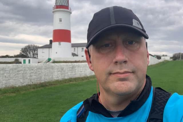 David Ansell pictured on one of his daily half marathon routes as he passed Souter Lighthouse in Whitburn.