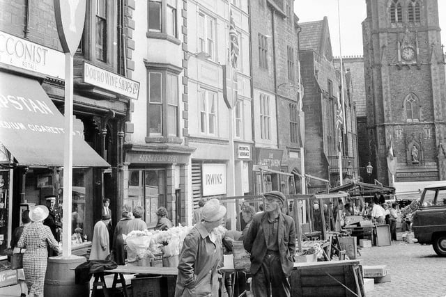 Moving across the region - flags in Durham Market Place in July 1966. Durham played a big part in hosting teams and fans for the World Cup. Picture: Bill Hawkins.