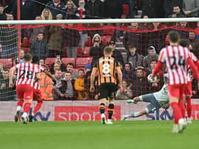 Amad scores from the penalty spot against Hull City.