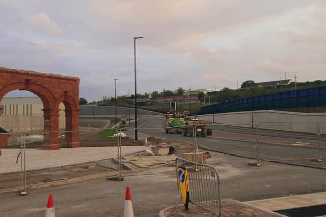 Work on the new dual carriageway beside the archway is nearing completion.